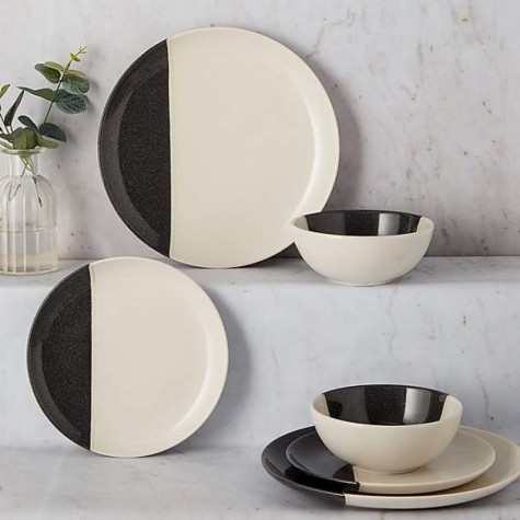 A 12 - piece dinner set soaked in charcoal