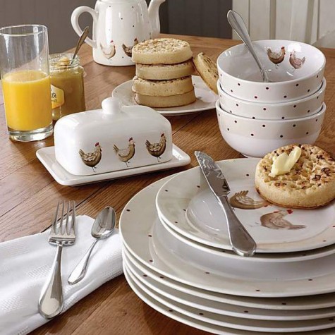 A set of 12 cottage style hen dinner dishes