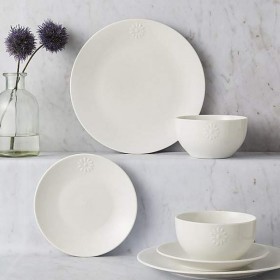 A 12-piece embossed dinner set