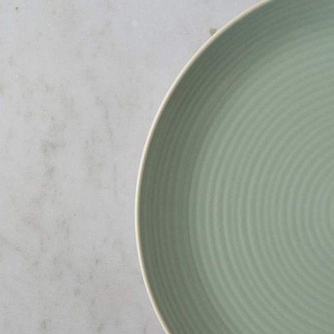 A set of 12 dinnerware with exquisite relief design for dinner